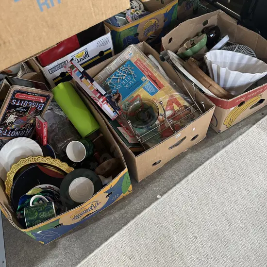 Three boxes games, coat hanger, clock, fan, fruit bowl and dinnerware etc.