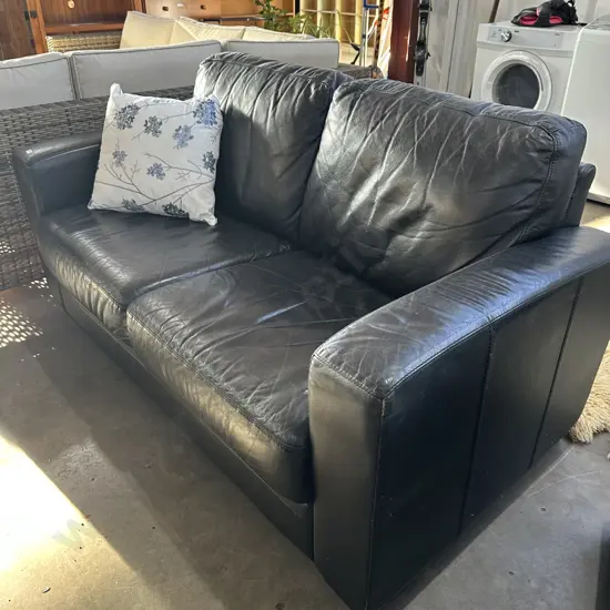 Black leather 2 seater sofa