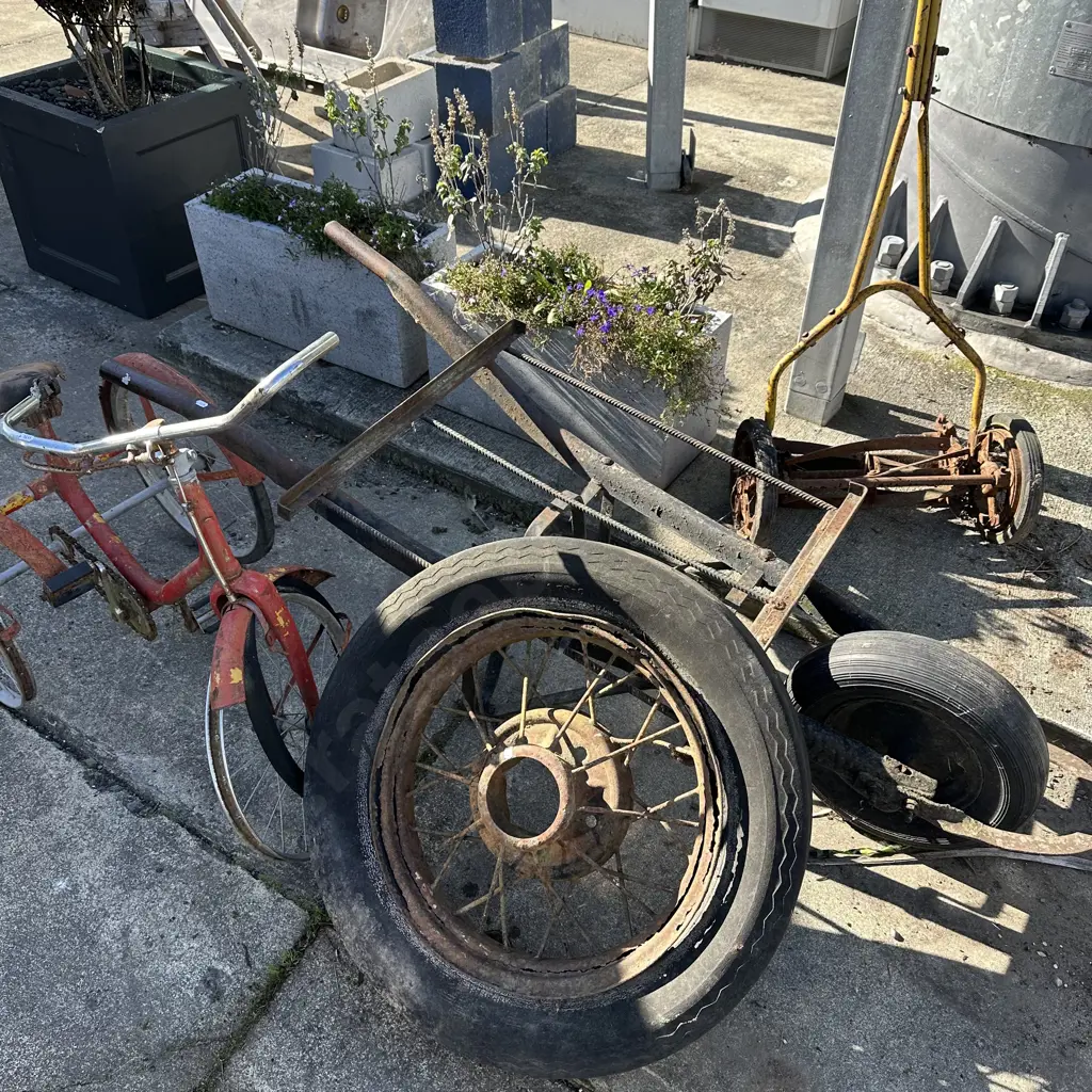 4 items garden art (hand mower, barrow frame, wheel, trike) Image 1++