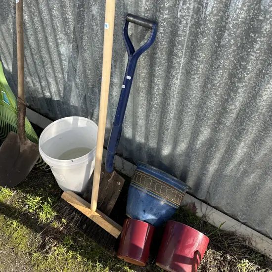 broom, planters and spade