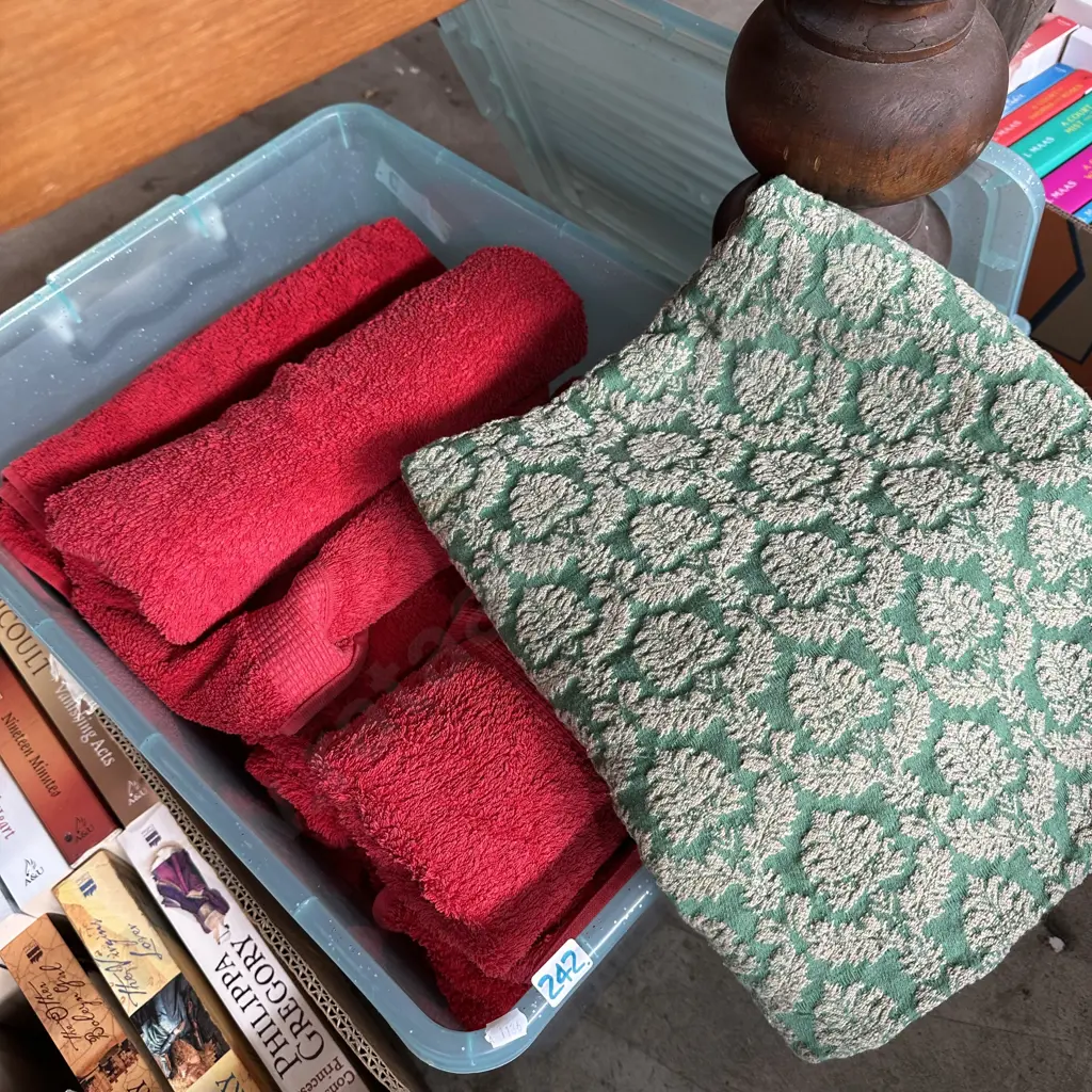 bin of Red towels and throw Image 1++
