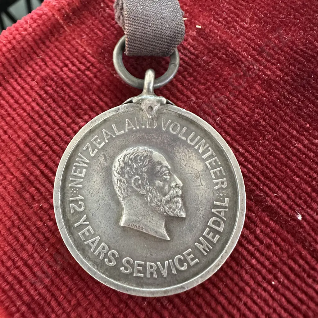 Sterling Silver medal 1911 "NZ volunteer 12 year service"  (click for details ) Image 1++