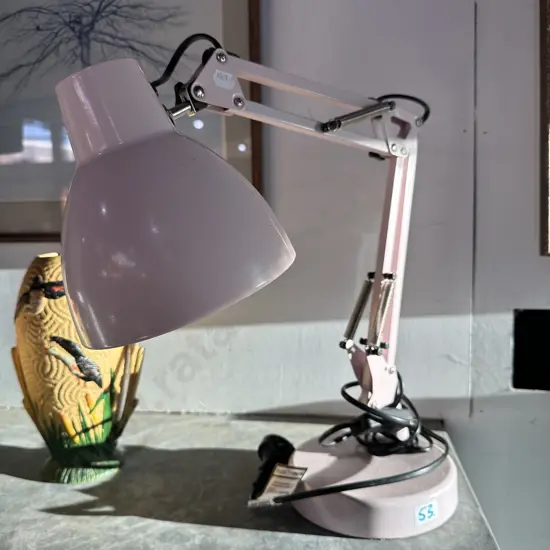 Pink angle poise lamp with tagged power lead