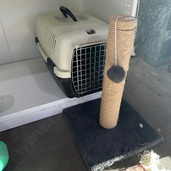 cat scratcher and pet cage