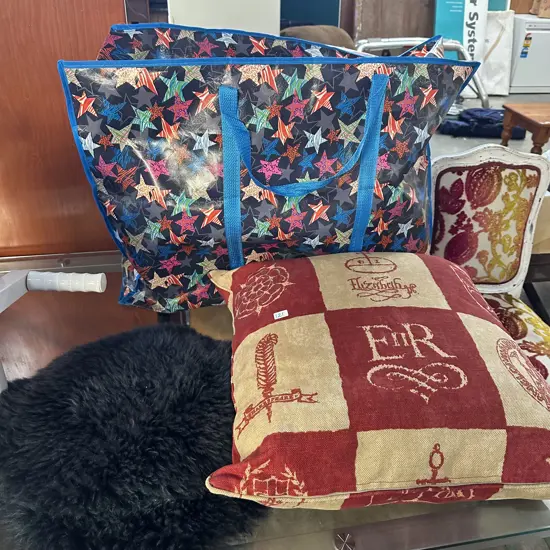Pr of sheepskin stool pads , large cushion and bag