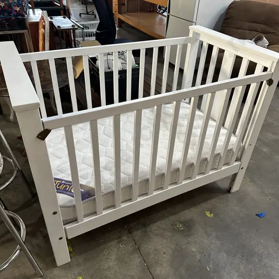 Drop side cot with good mattress
