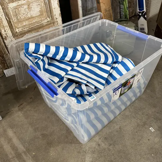 large bin of caterers table covers