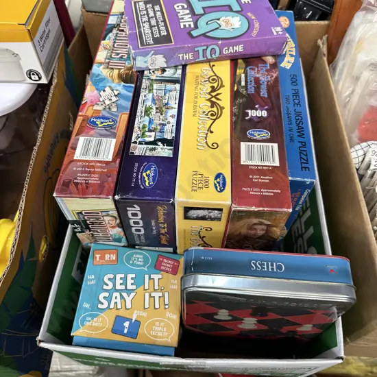 Box lot five puzzles, chess set plus card games.