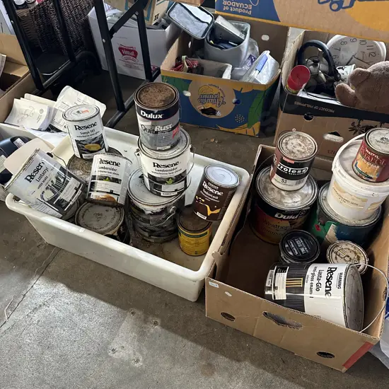 Bin and box of paint.