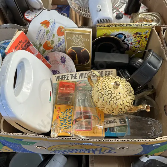 Box lot of books, glassware, ear muffs, collectable plates etc.