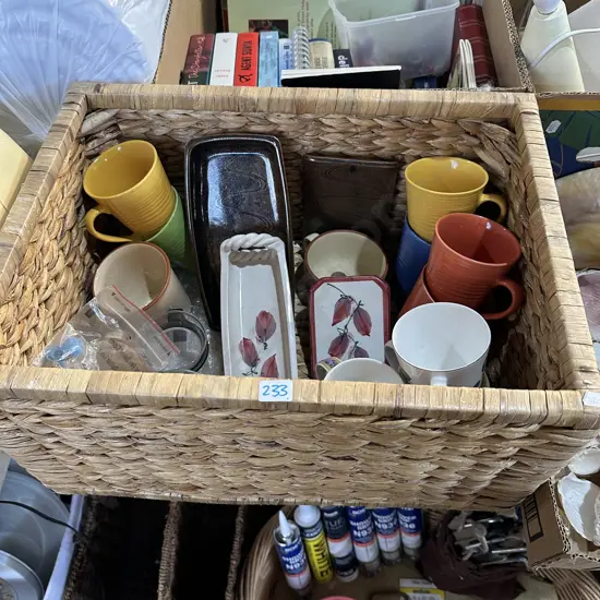 Basket of mugs, pottery and coins etc.
