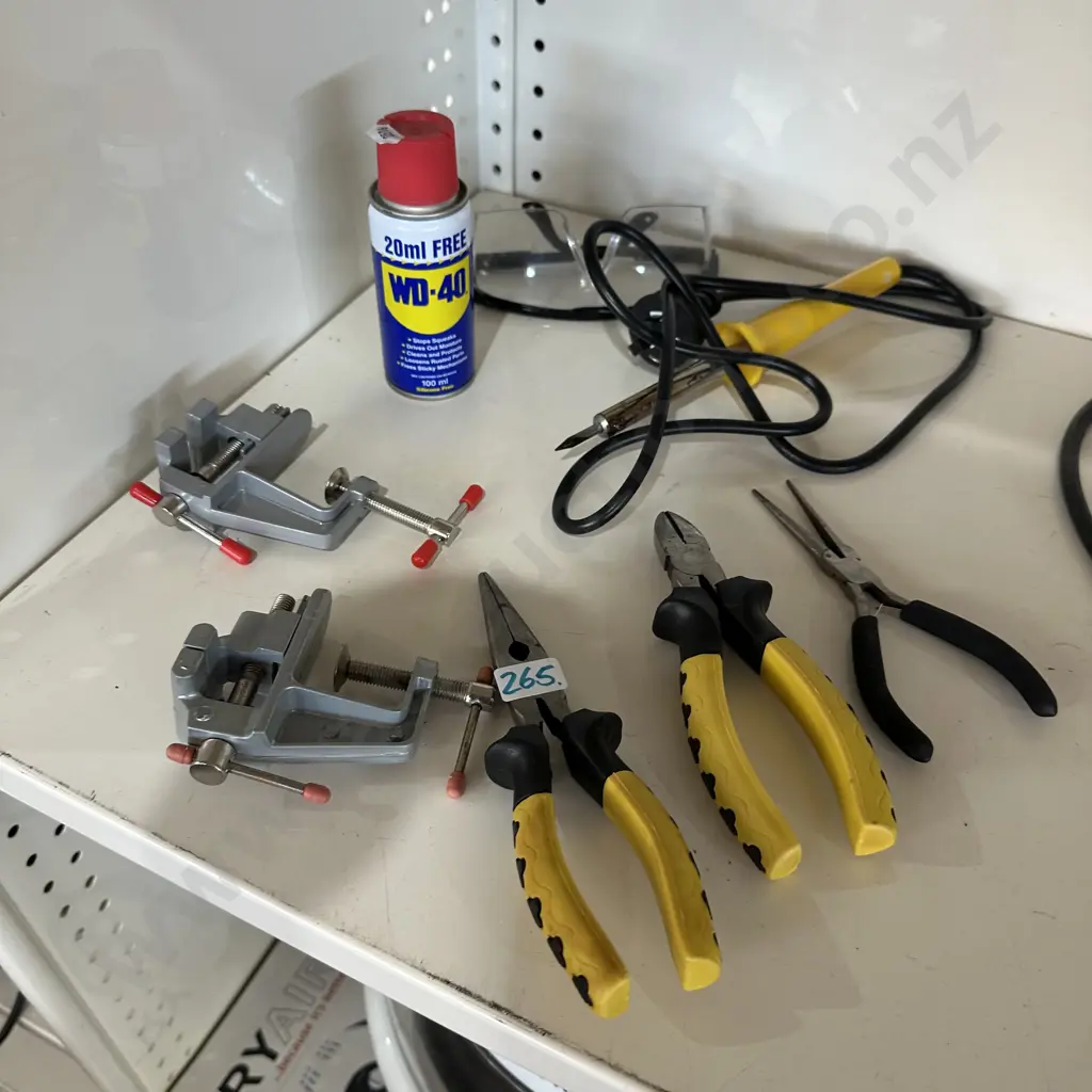 Shelf lot of assorted tools and WD-40. Image 1++