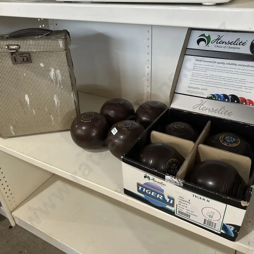 Two sets of lawn bowls plus vintage case. Image 1++