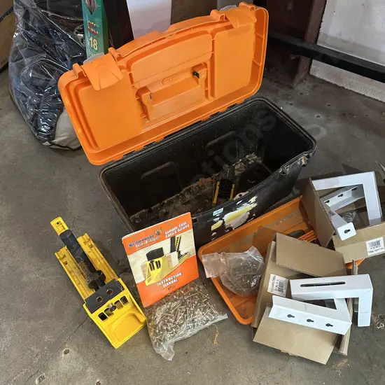 Toolbox with The renovator Join-A-Jig, screws and two pairs of shelf brackets.
