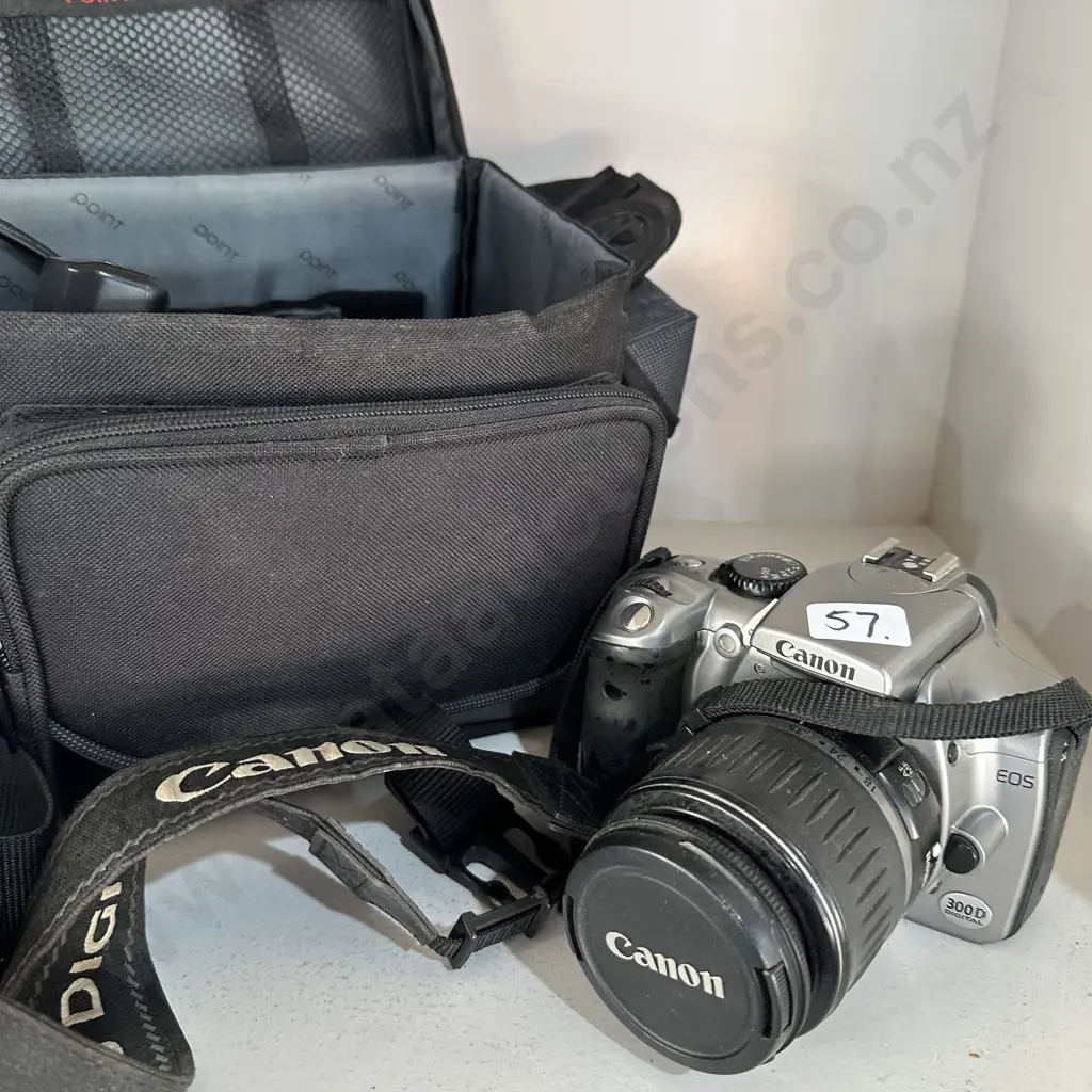 Canon EOS camera and bag Image 1++