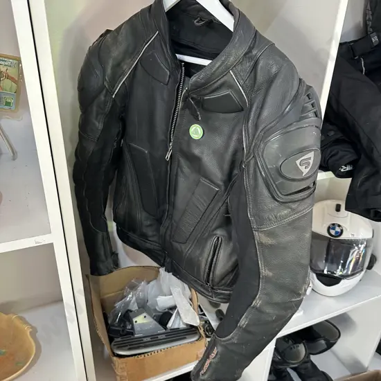 leather jacket and bike parts