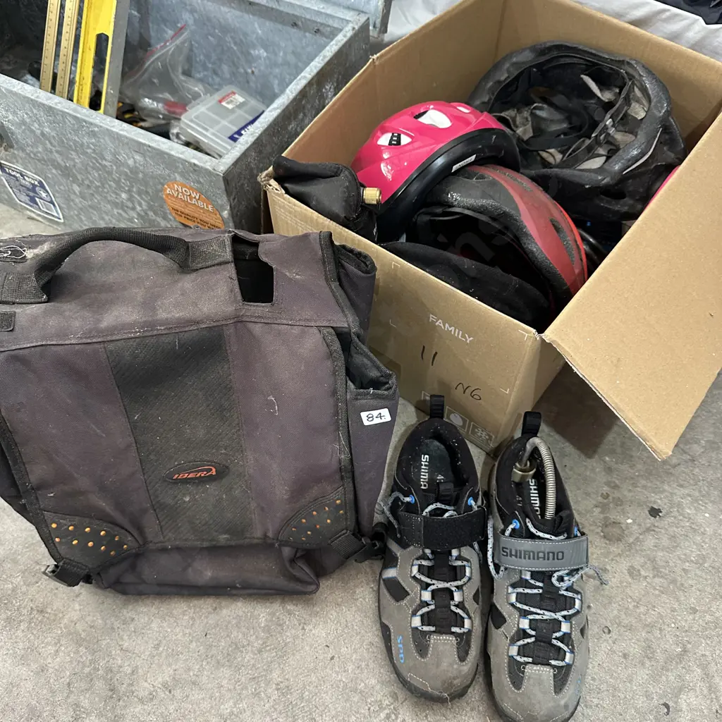 saddle bag, stack hats and bike shoes/gear Image 1++