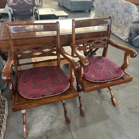 Pr of matching carved Teak carver chairs