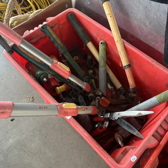 bin of gardening tools