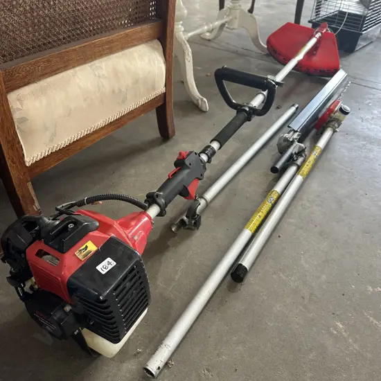 Toolshed petrol multi tool with strimmer, chainsaw, and hedge trimmer