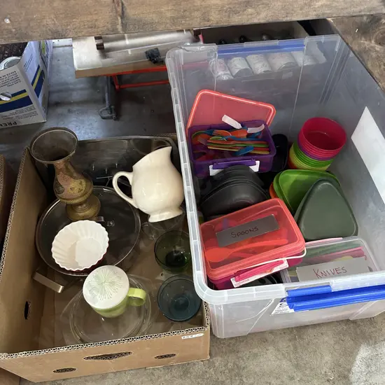 Bin of plasticware plus lidded pot, meat carving tray, brass vase etc.