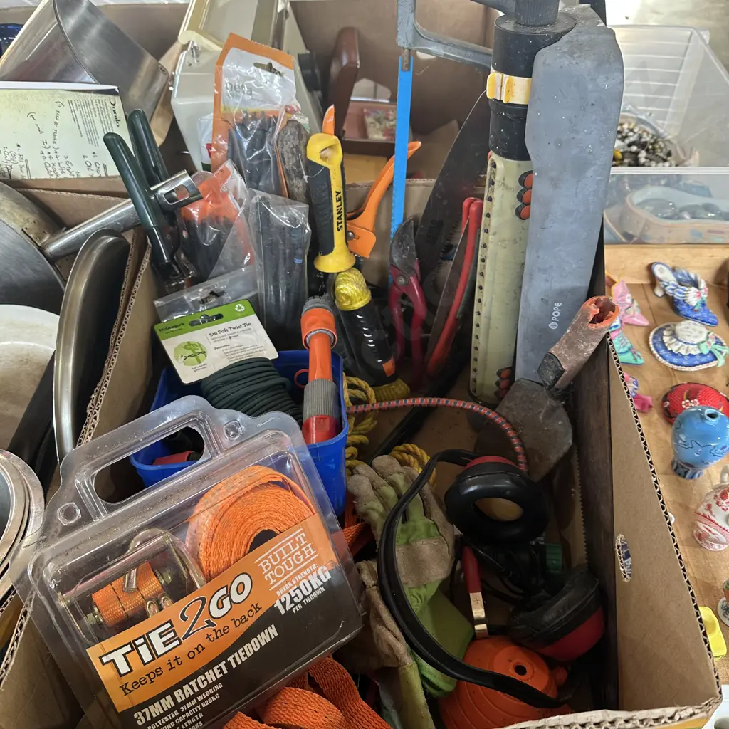 Box lot garden tools and saws, tie downs, sprinklers and hose attachments etc. Image 1++