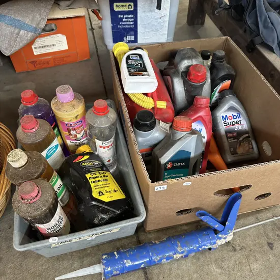 Two boxes petrol can, oils including Linseed oil, Meths, turps and caulking gun etc.
