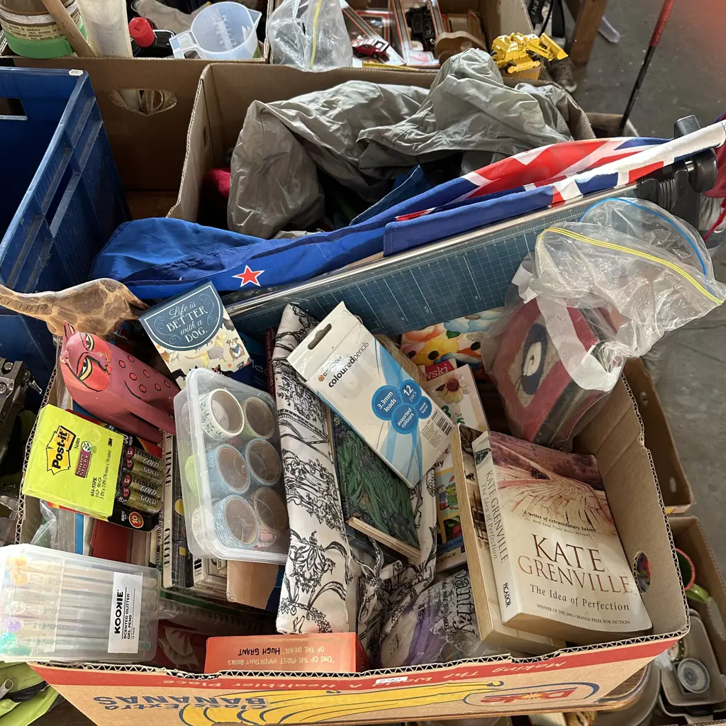 Two boxes books and stationary items plus rain jackets and cleaning cloths etc. Image 1++