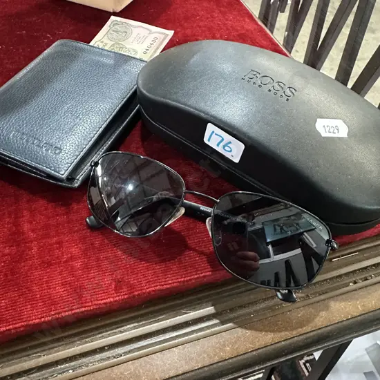 Hugo Boss sunglasses and wallet.