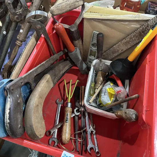 Bin of tools and sandpaper etc.
