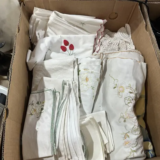 Box lot of vintage embroidered linen.