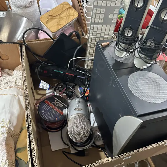 Box lot powered sub-woofer, DVD writer, speaker cable, Blue Yeti USB microphone etc.