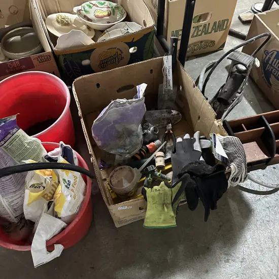 Bay lot gardening tools and gloves plus potting mix and pump etc.