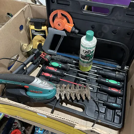 Box lot screwdriver set, Bosch Lithium-ion hedge trimmer, tools and coat hook etc.