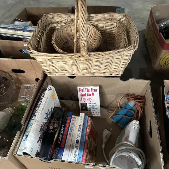Cane baskets, skipping rope weights, iron and books.