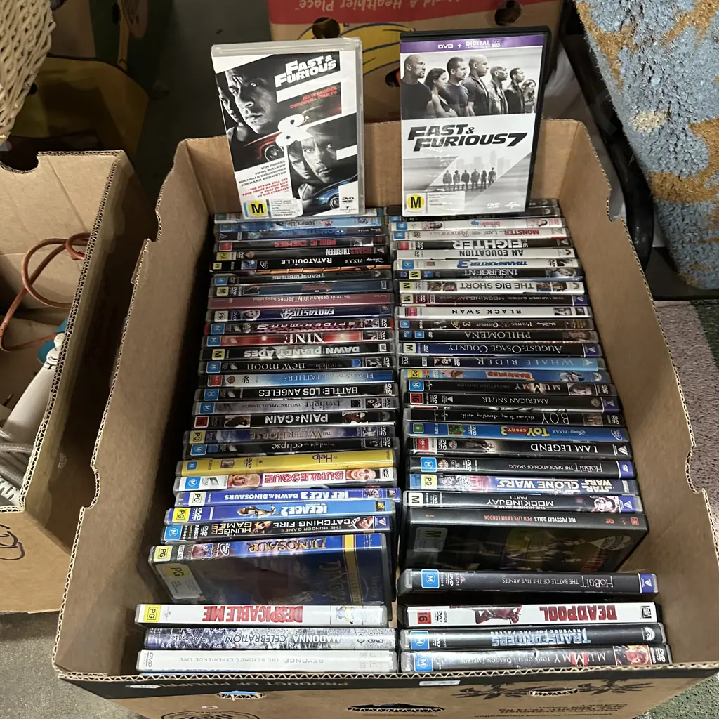 Box lot of DVD movies. Image 1++