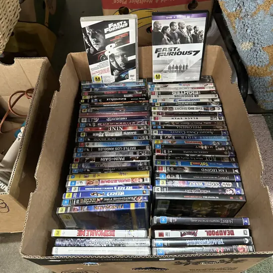 Box lot of DVD movies.