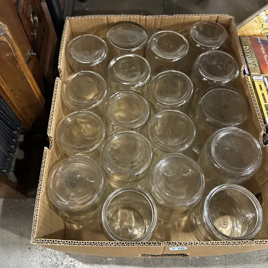 Sixteen Agee jars plus two others.