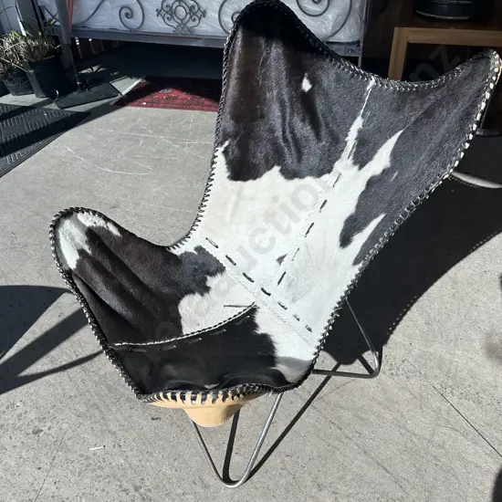 Cowhide butterfly chair on wrought iron base