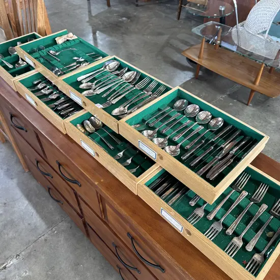 wooden drawers of "Community" Sheffield cutlery