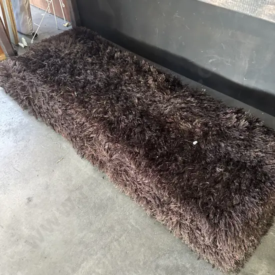 Brown long pile rug