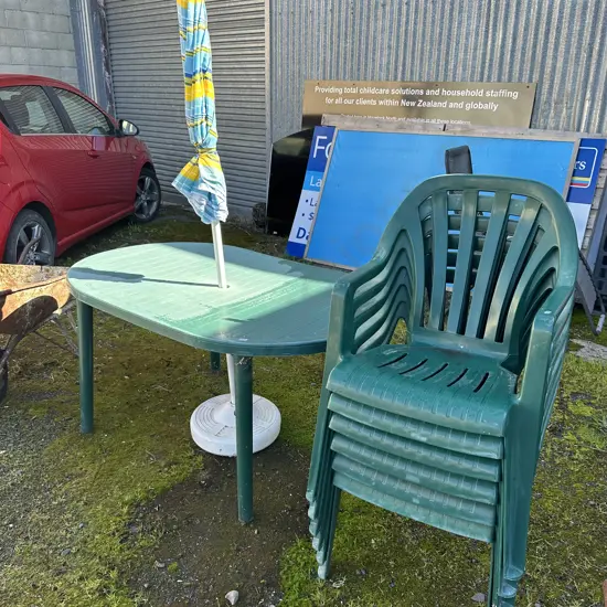 plastic table and chairs, umbrella