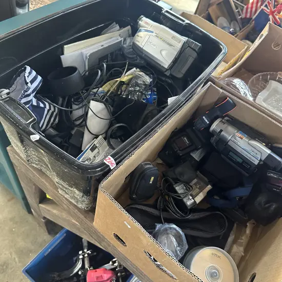 bin and box Sony handy cams and camera parts etc