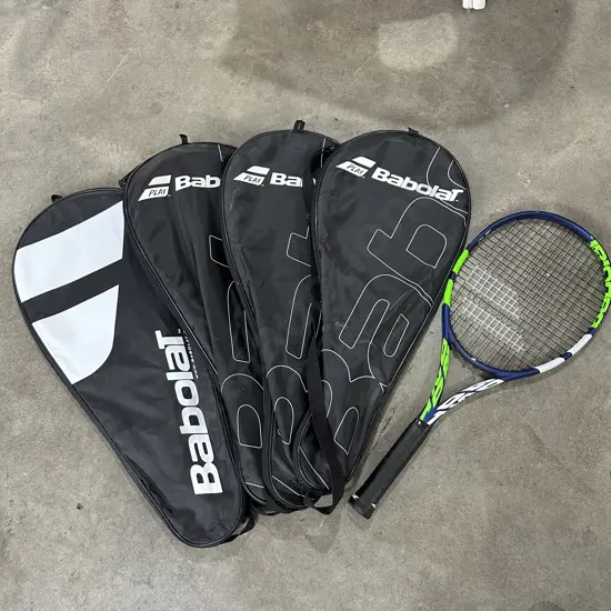 4 good tennis rackets and bags