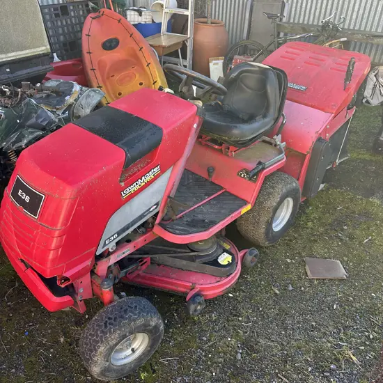 LawnMaster ride on mower - working but well used (picks up wet grass to)