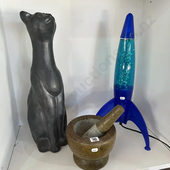 cat, lamp and pestle morter