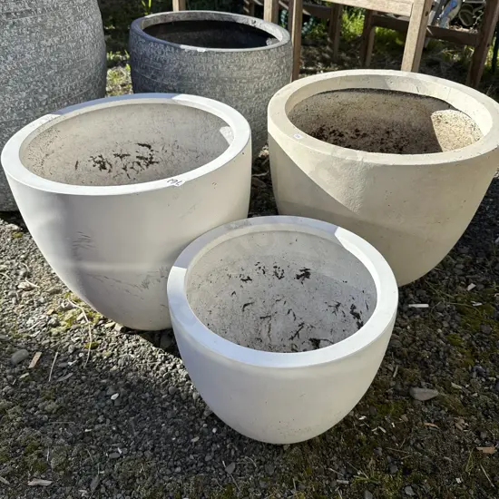 3 white planters