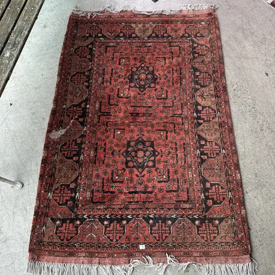 Persian rug with wax spill 1500 x 950