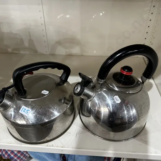 2 whistling kettles