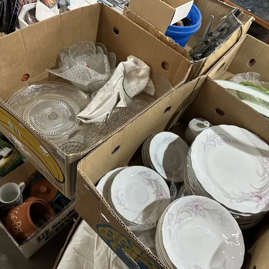 Two boxes dinnerware and glassware.